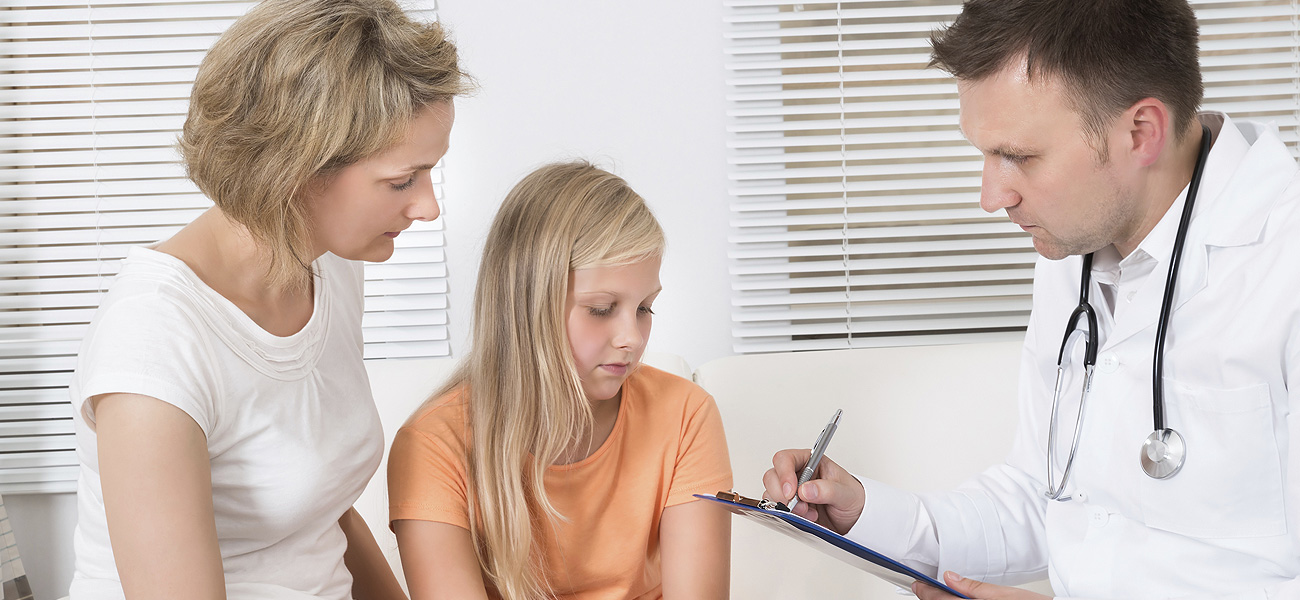 image of child patient and doctor